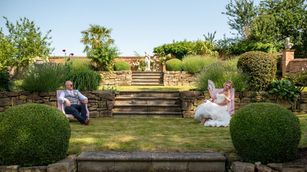 Couple enjoying the sunshine at their Derbyshire wedding venues